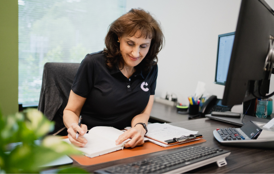 Craft team member working at their desk