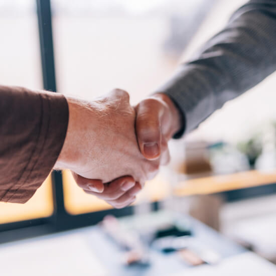 two people shaking hands