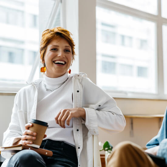 smiling woman in group setting