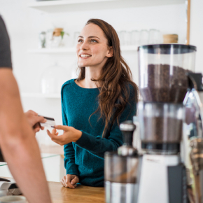 person using debit card for payment
