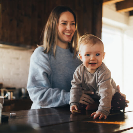 son and mother in kitchen