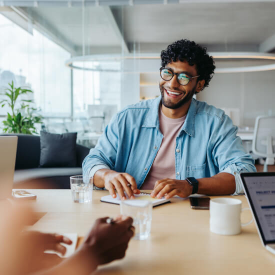 man smiling in office