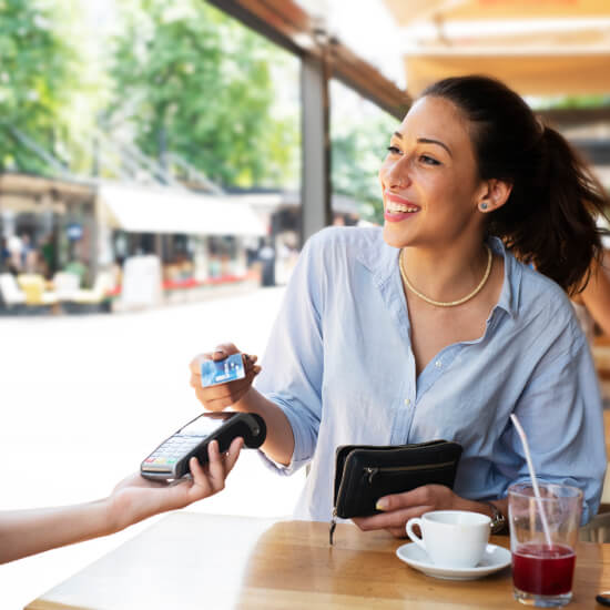 person paying with card 